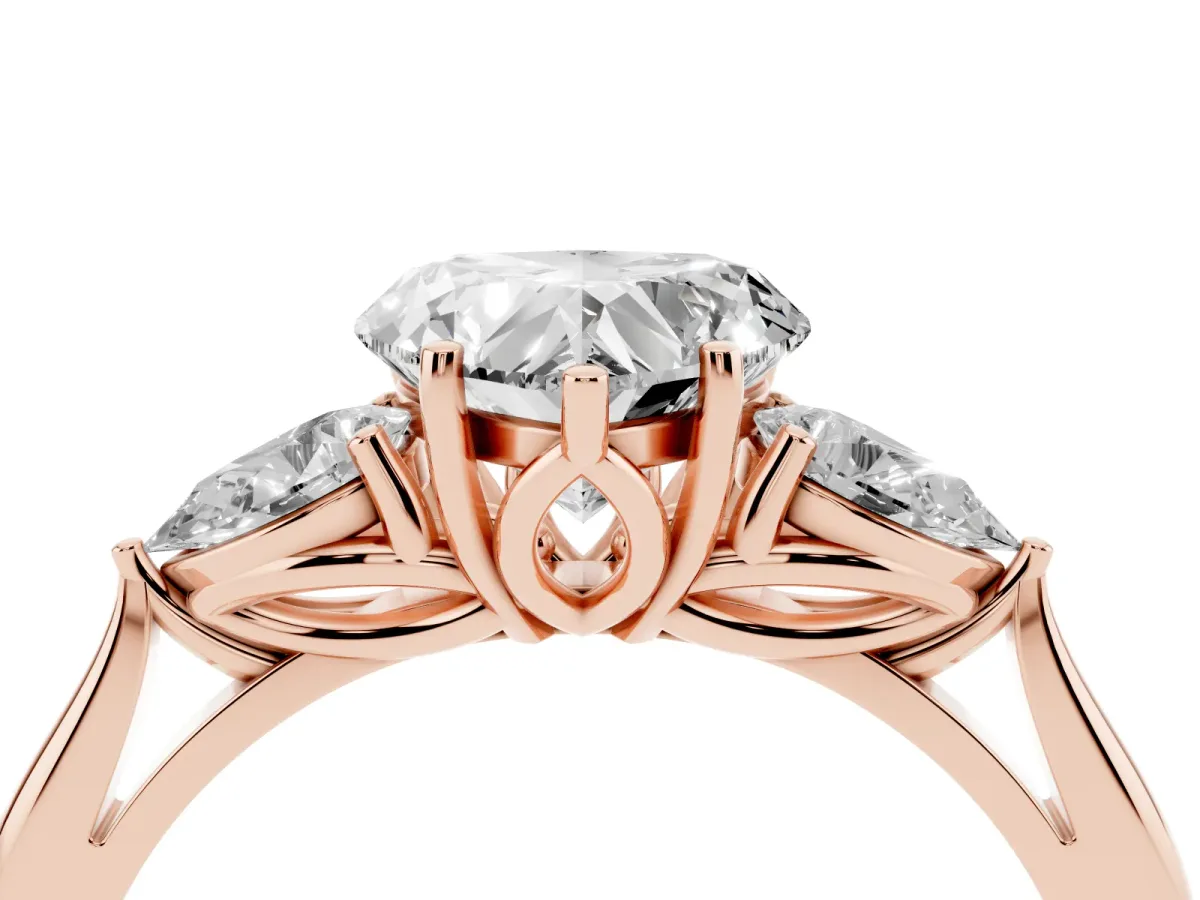 Heart Cut Diamond Three-Stone Ring with Pear Side Stones and Prong Setting Rose gold