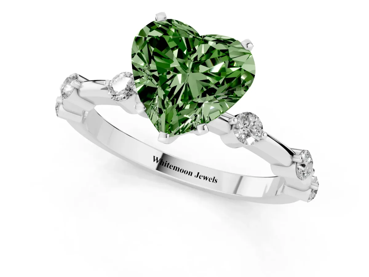 Fancy Green Heart Cut Solitaire Diamond Ring with Bezel Set Side Stones and Prong Setting Silver