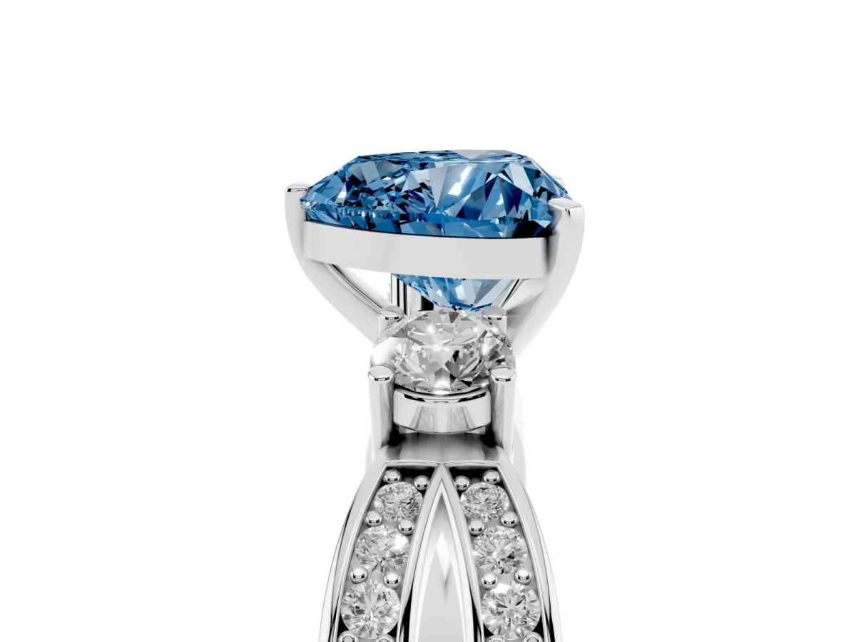 Fancy Blue Three-Stone Heart Cut Cut Diamond Twist Band with Prong Setting Silver