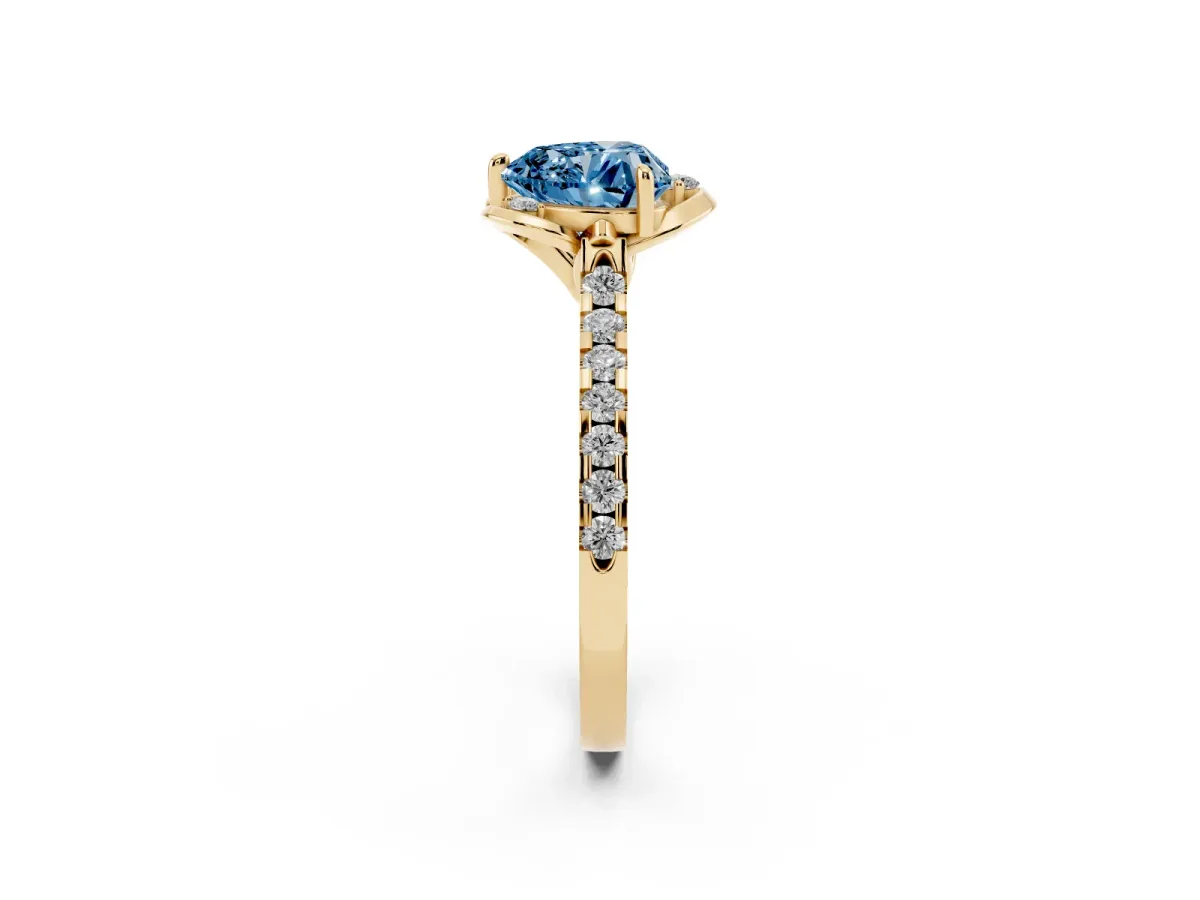 Fancy Blue Heart Cut Diamond Ring with Pavé Band and Floral Prong Setting Yellow gold