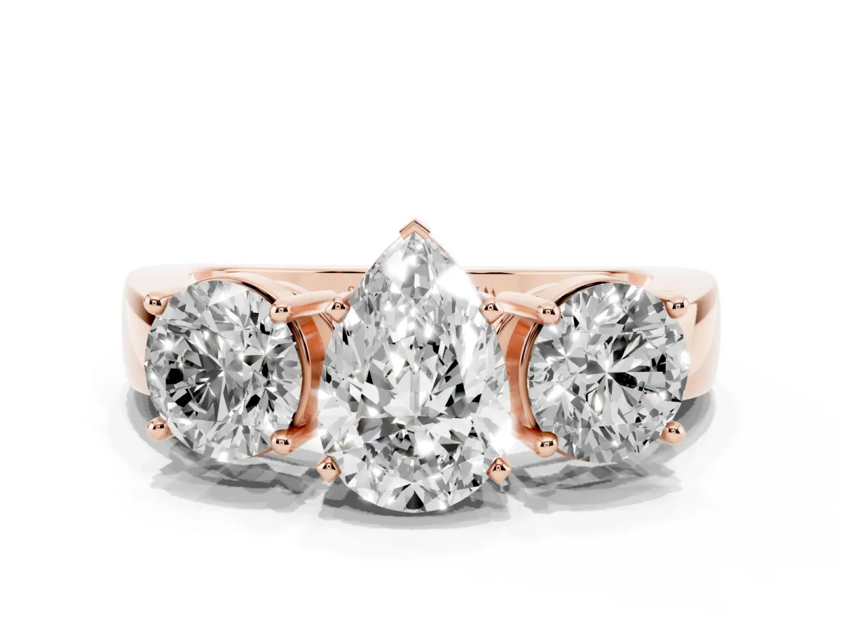 Three-Stone Pear Cut Diamond Ring with Round Side Stones, Classic Band, and Four-Prong Setting Rose gold