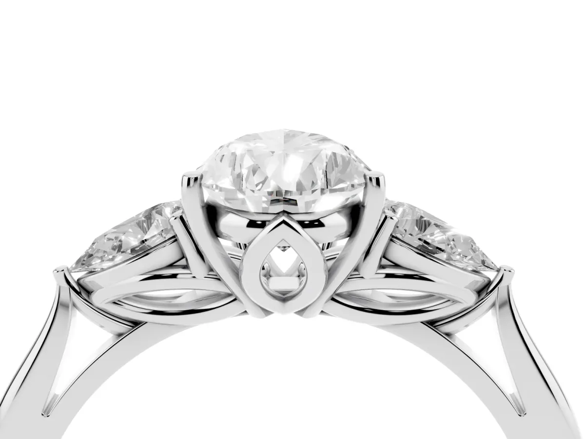Three-Stone Pear Cut Diamond Ring with Pear Side Stones in Four-Prong Setting Silver