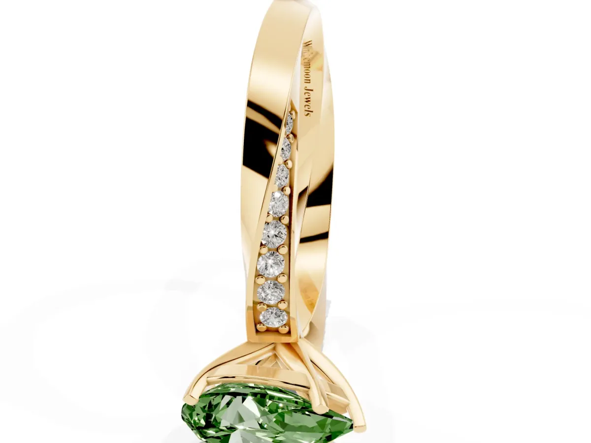Fancy Green Pear Cut Diamond Engagement Ring with Side Stone Accents and Four-Prong Setting Yellow gold