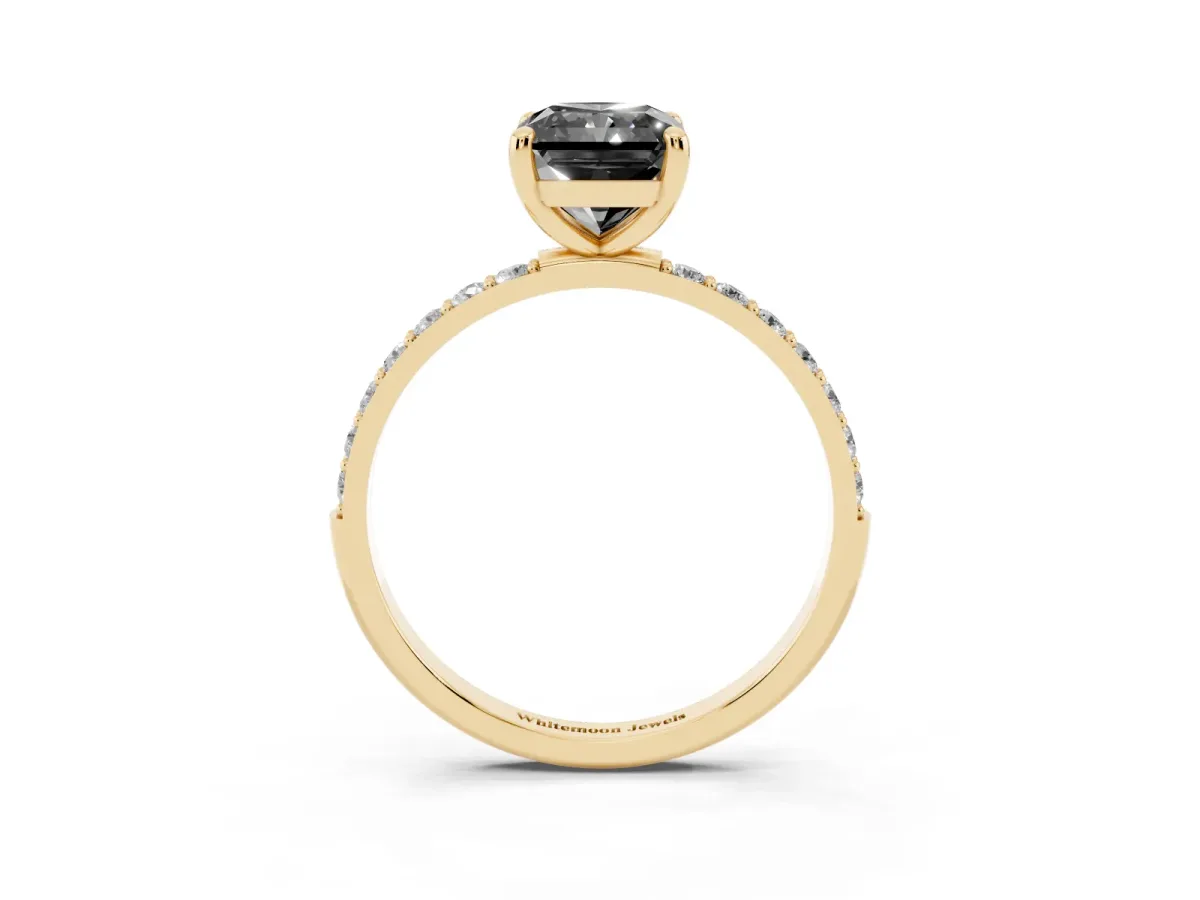 Fancy Black Radiant Cut Diamond Solitaire Ring with Round Pavé Band and Prong Setting Yellow gold