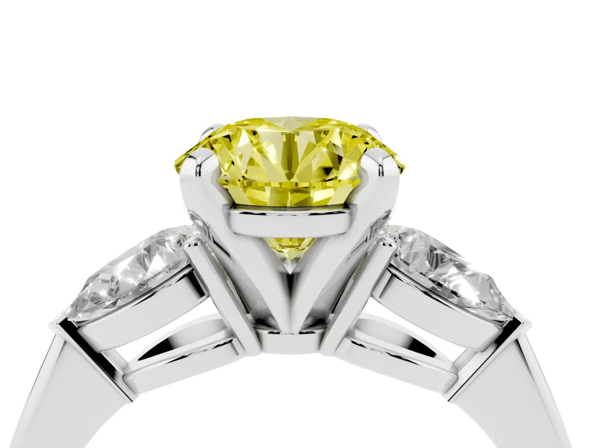Fancy Yellow Three-Stone Round Cut Diamond Ring with Pear Side Stones and Four-Prong Setting Platinum