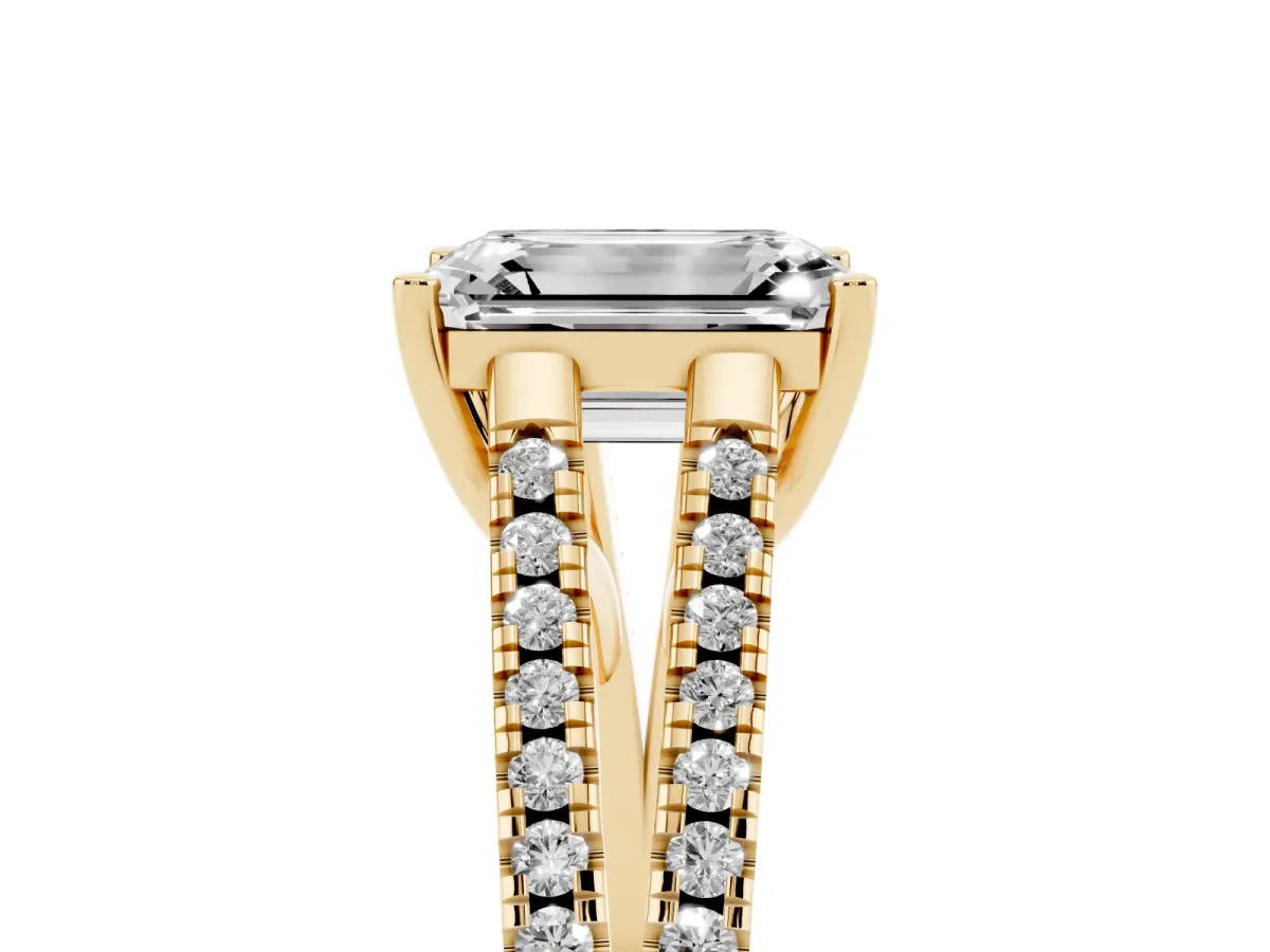 Emerald Cut Diamond Solitaire Engagement Ring with Split Shank Pavé Band Yellow gold