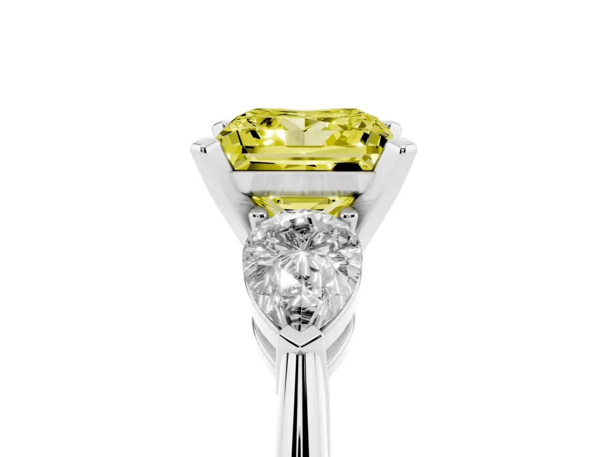 Fancy Yellow Three-Stone Princess Cut Diamond Ring with Pear Side Stones and Four-Prong Setting Silver