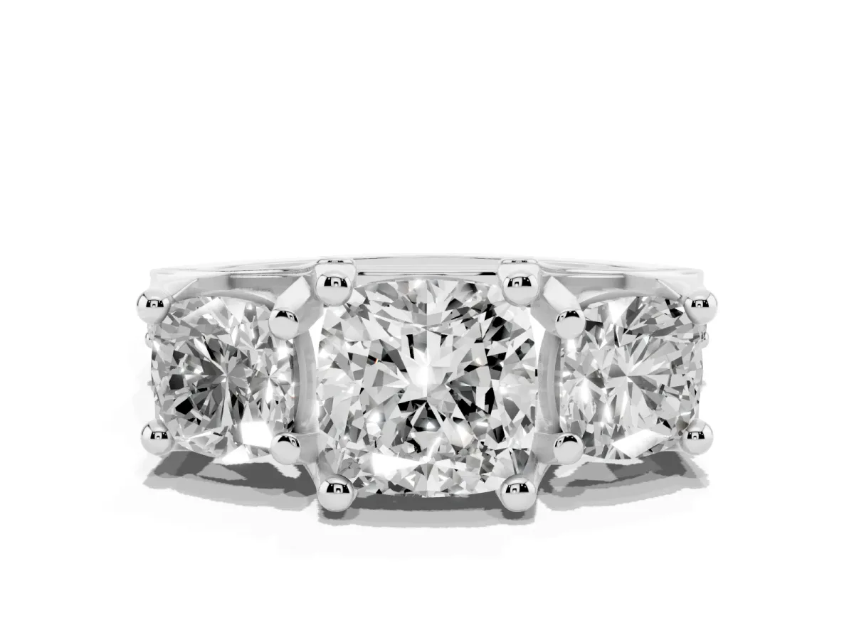 Cushion Cut Diamond Three-Stone Ring with Channel Set Band and Four-Prong Setting Silver