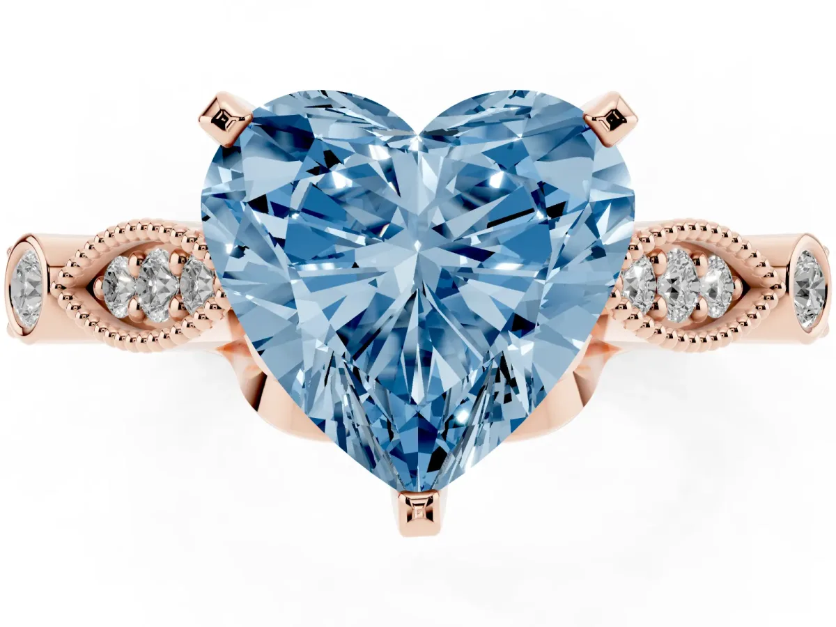 Fancy Blue Heart Cut Cut Diamond with Milgrain Marquise and Bezel Accents on a Solitaire Band with Prong Setting Rose gold