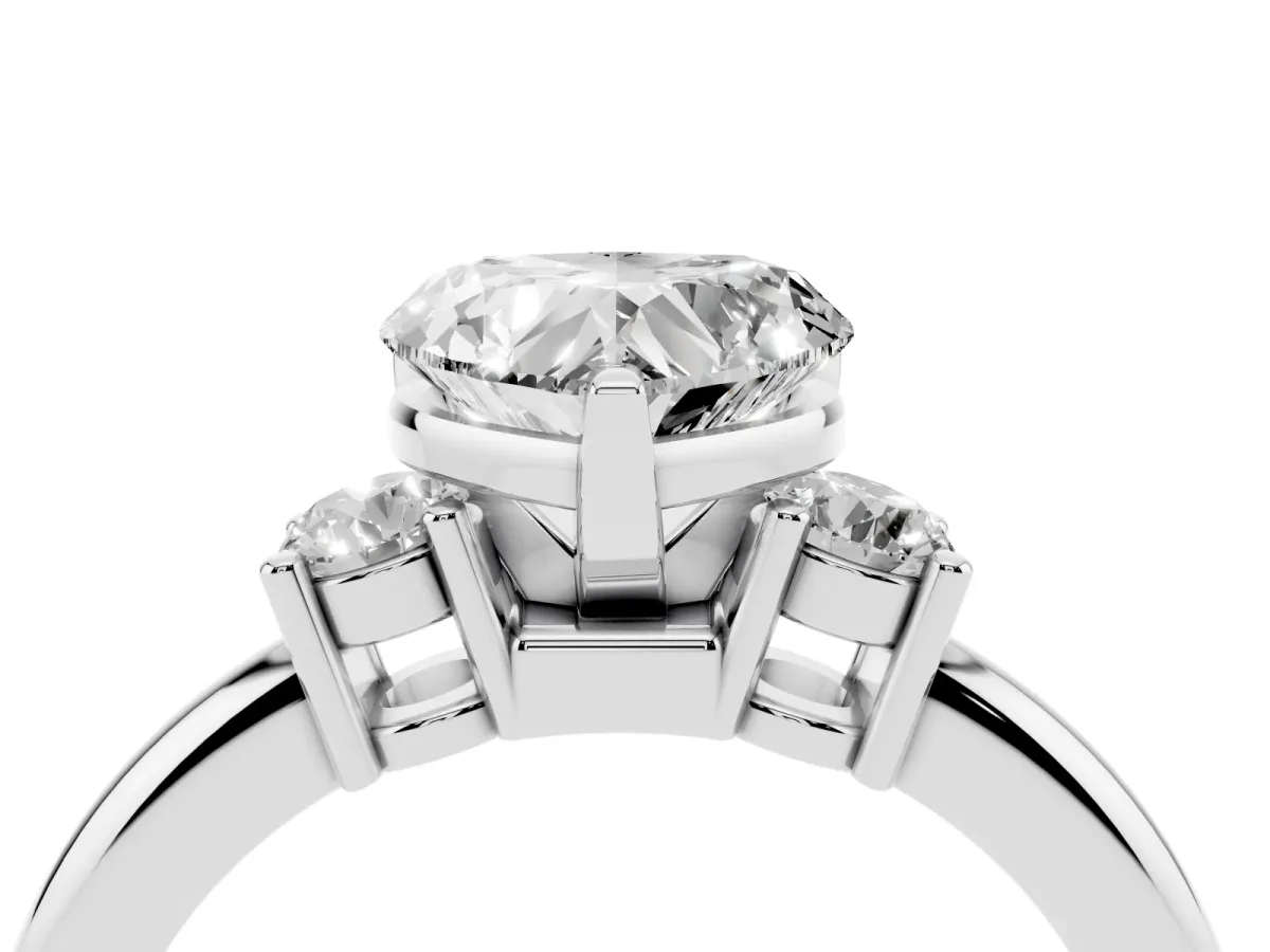 Three-Stone Heart Cut Cut Diamond Solitaire with Prong Setting and Classic Band Silver
