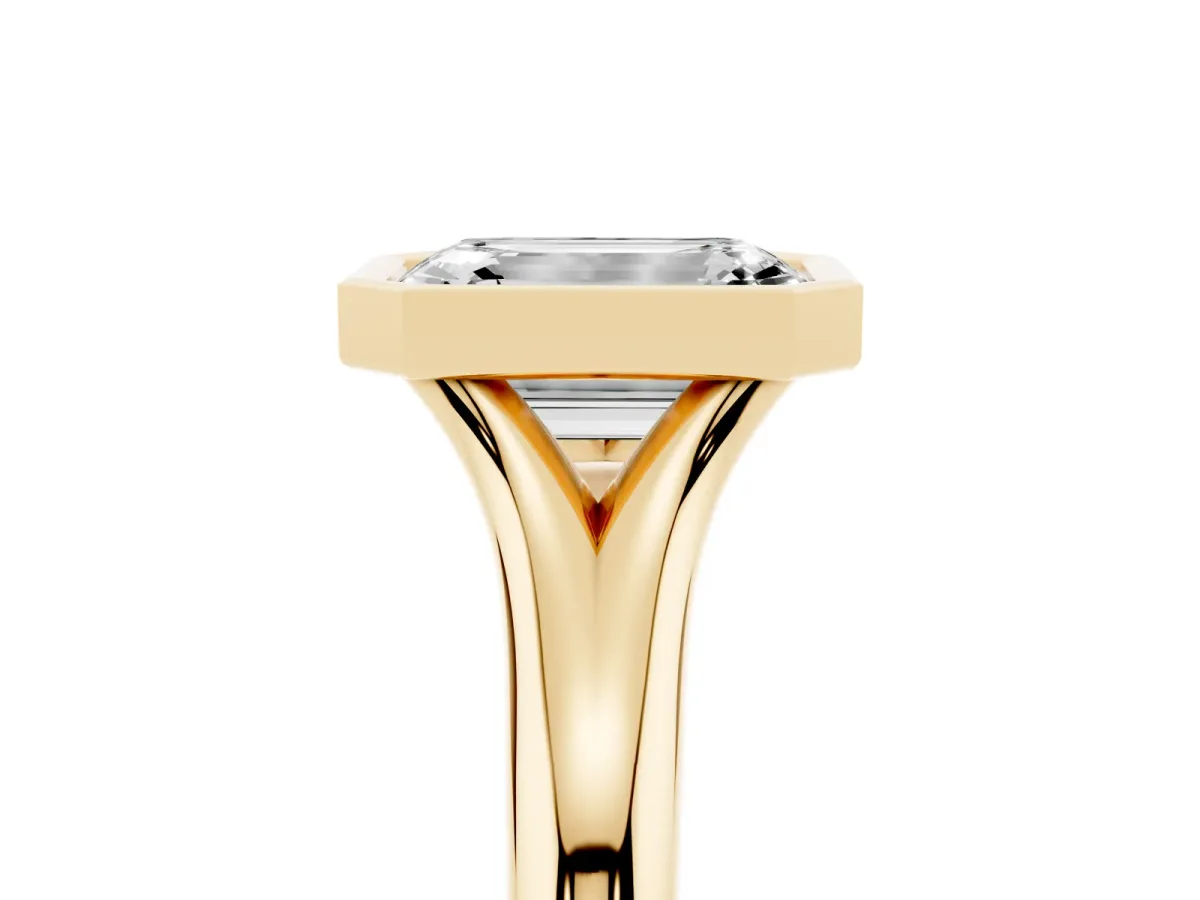 Bezel Set Emerald Cut Solitaire Diamond Ring with Smooth Band Yellow gold