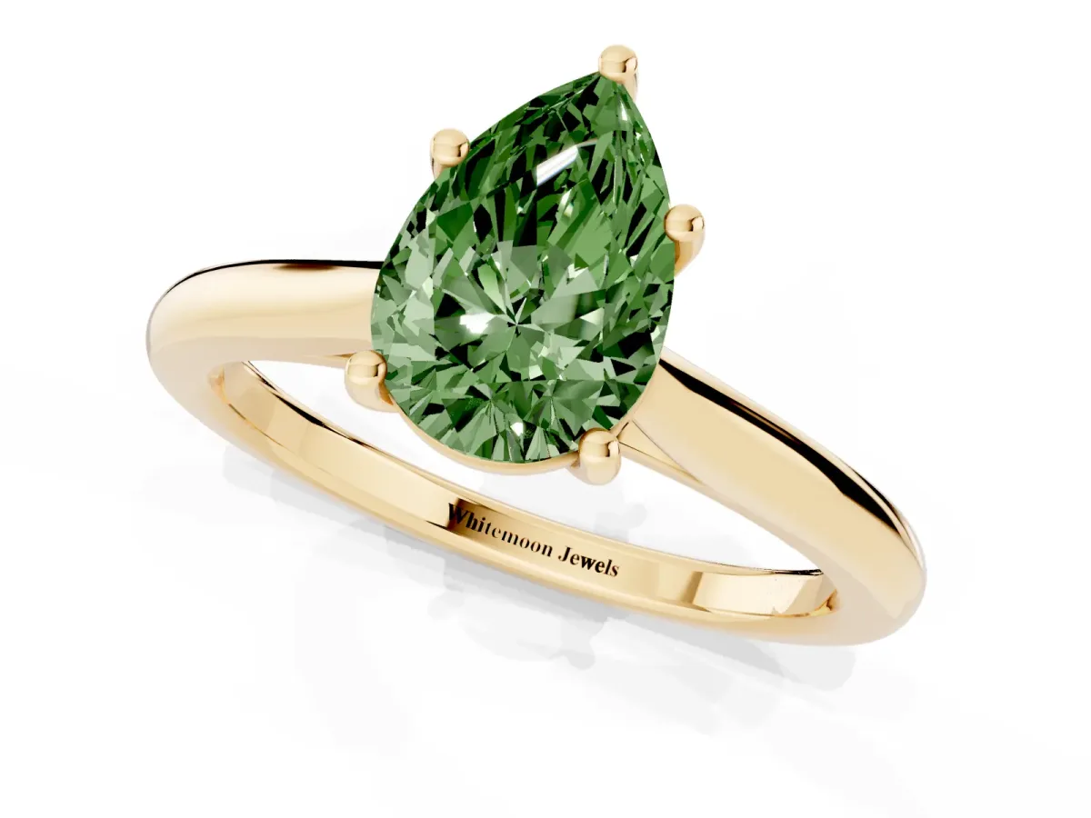 Fancy Green Pear Cut Cut Solitaire Ring with Cathedral Band and Four-Prong Setting Yellow gold