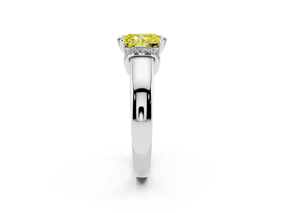 Fancy Yellow Radiant Cut Solitaire Diamond Ring with Pave Band and Six-Prong Setting Platinum