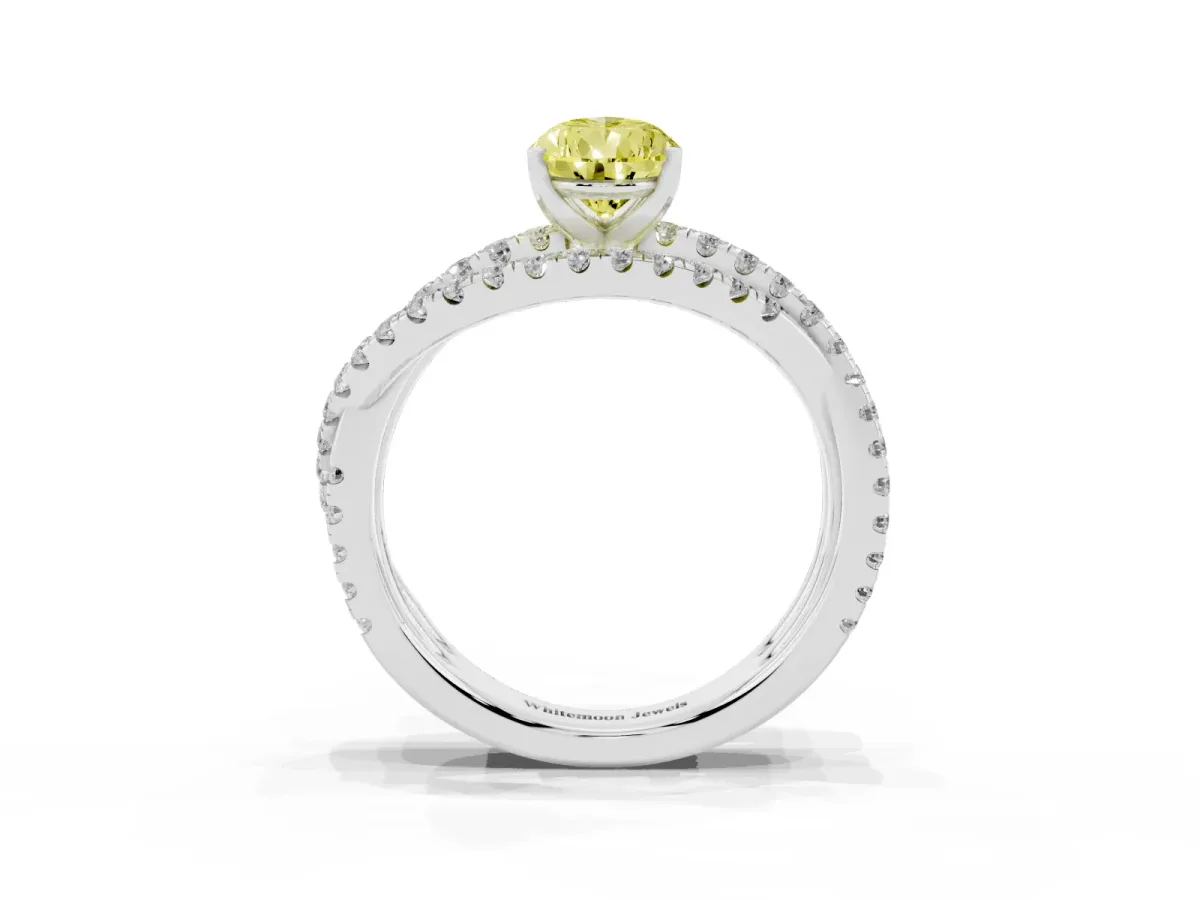 Fancy Yellow Pear Cut Solitaire Twist Band with Pavé Setting and Four-Prong Setting Silver
