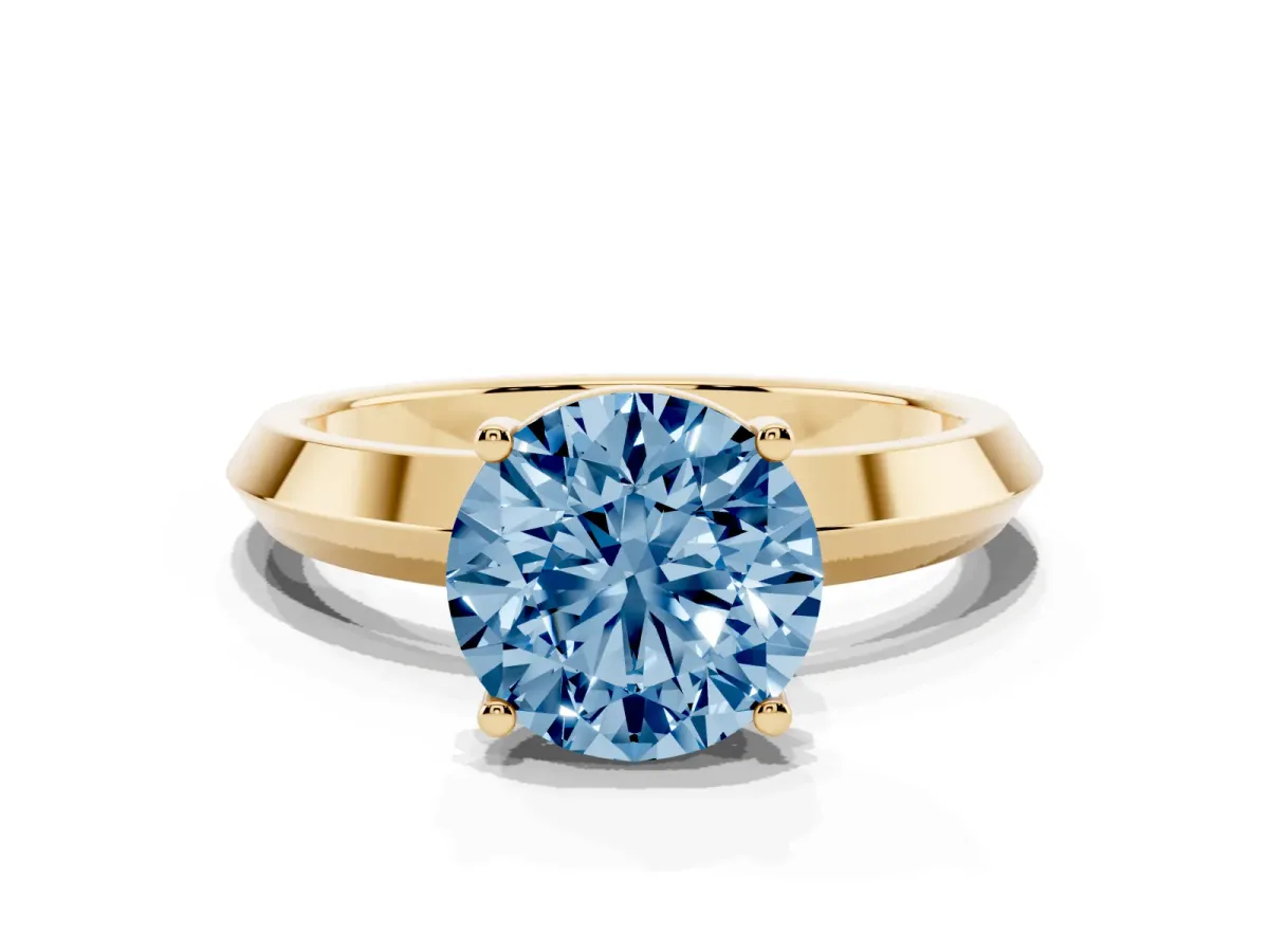 Fancy Blue Round Cut Cut Solitaire Engagement Ring with Flat Band and Four-Prong Setting Yellow gold