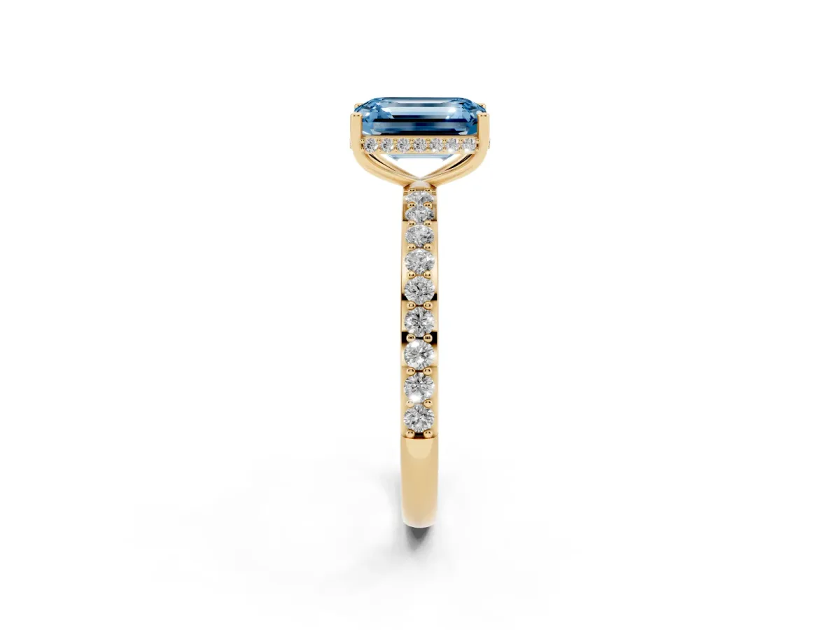 Fancy Blue Emerald Cut Diamond Solitaire Ring with Pavé Band and Hidden Halo Yellow gold