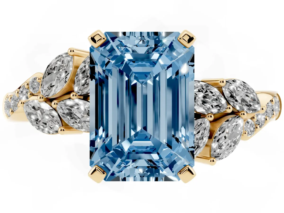 Fancy Blue Emerald Cut Solitaire Marquise Twist Band with Six-Prong Setting Yellow gold