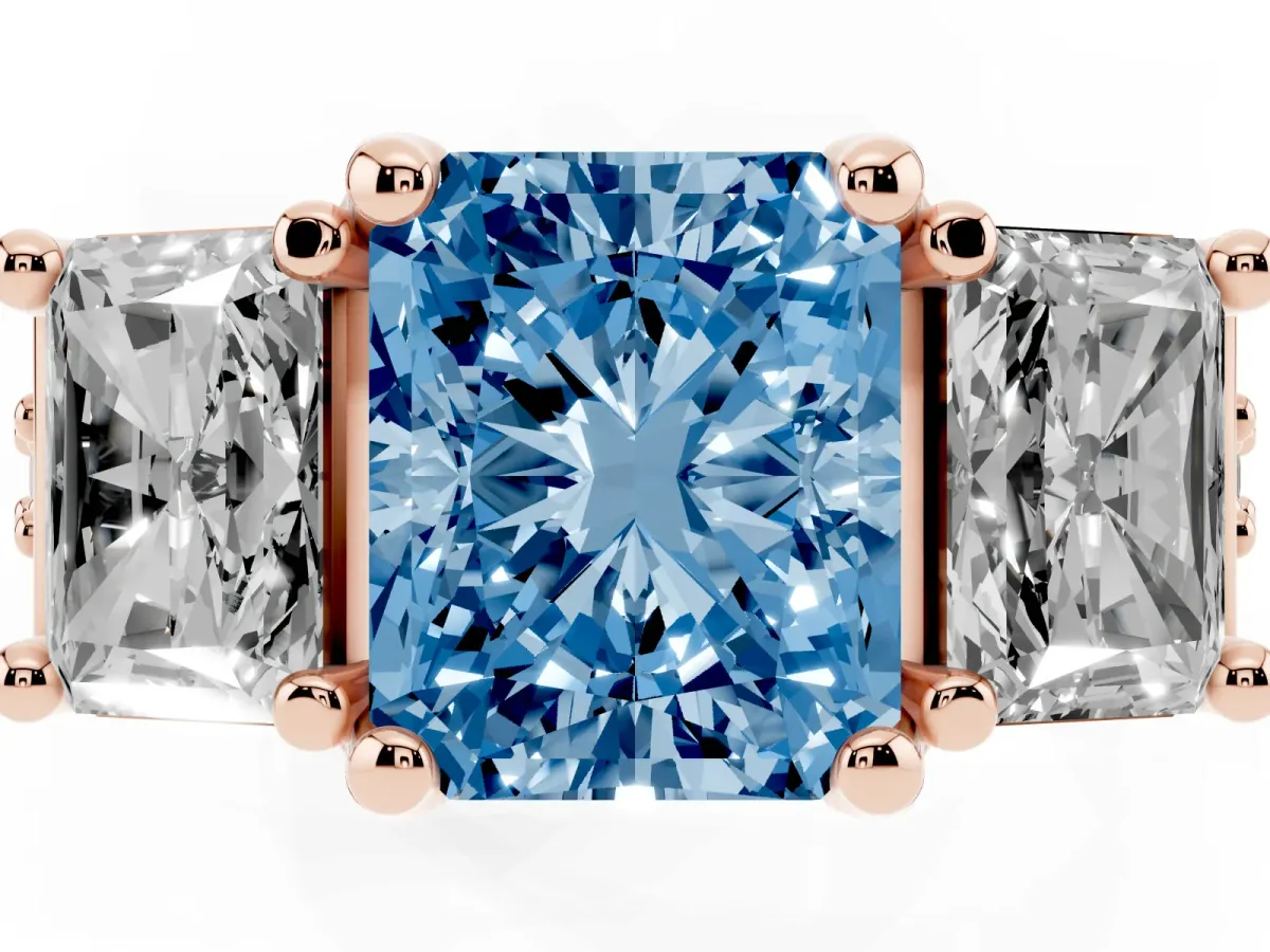 Fancy Blue Radiant Cut Diamond Three-Stone Ring with Channel Set Band and Four-Prong Setting Rose gold