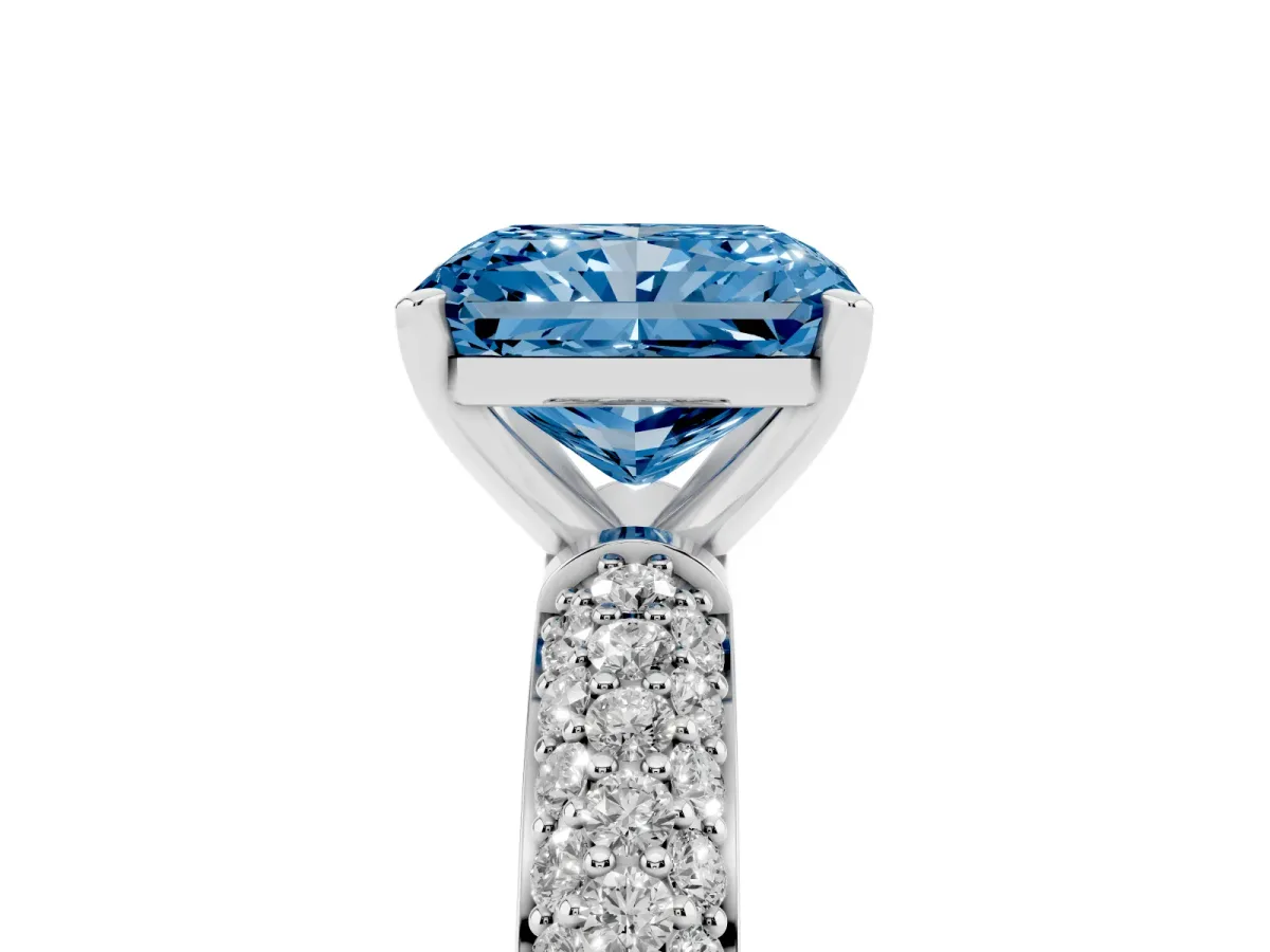 Fancy Blue Radiant Cut Diamond Solitaire Ring with Prong Setting and Pavé Band Silver
