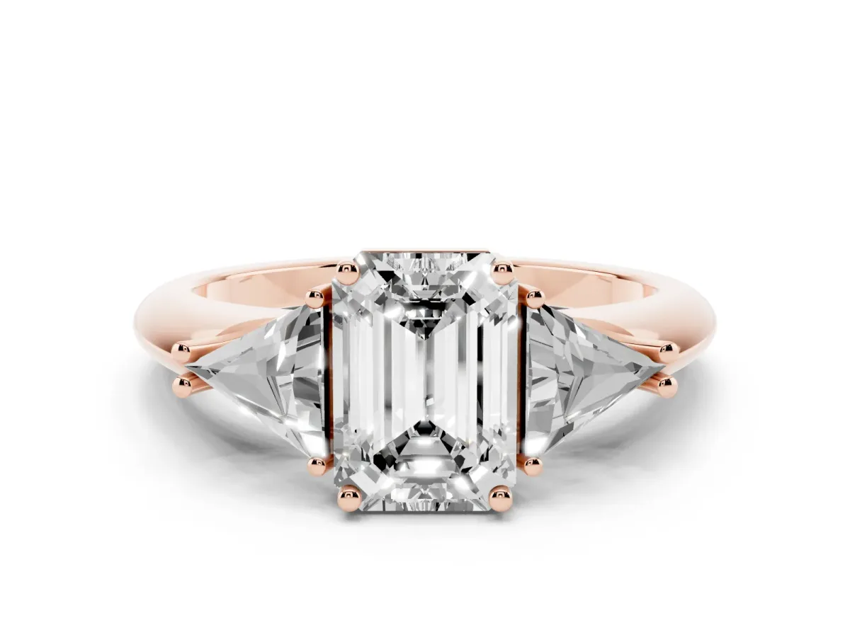 Three-Stone Emerald Cut Diamond Engagement Ring with Trillion Side Stones and Prong Setting Rose gold