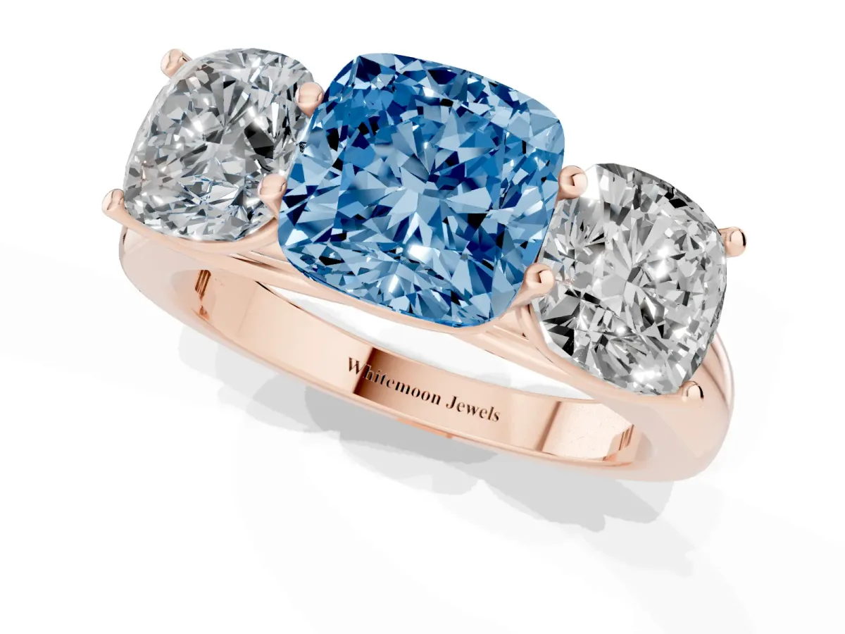 Fancy Blue Cushion Cut Three-Stone Diamond Ring with Prong Setting on a Classic Band Rose gold