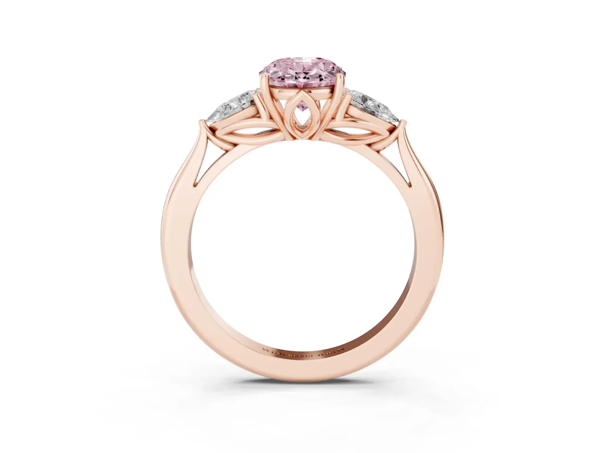Fancy Pink Three-Stone Oval Cut Diamond Ring with Pear Side Stones in Four-Prong Setting Rose gold