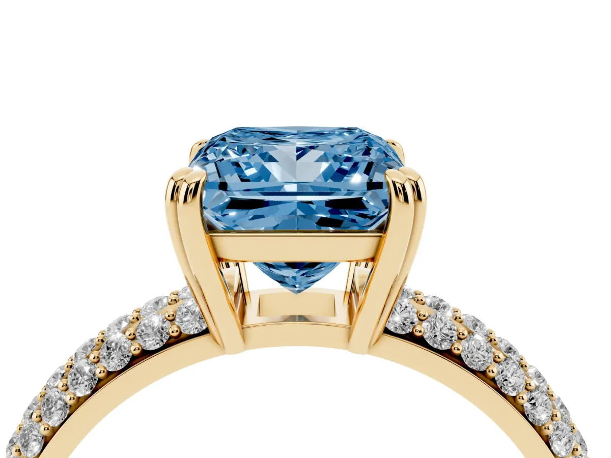 Fancy Blue Princess Cut Diamond Solitaire Ring with Multi-Row Round Pavé Band and Prong Setting Yellow gold