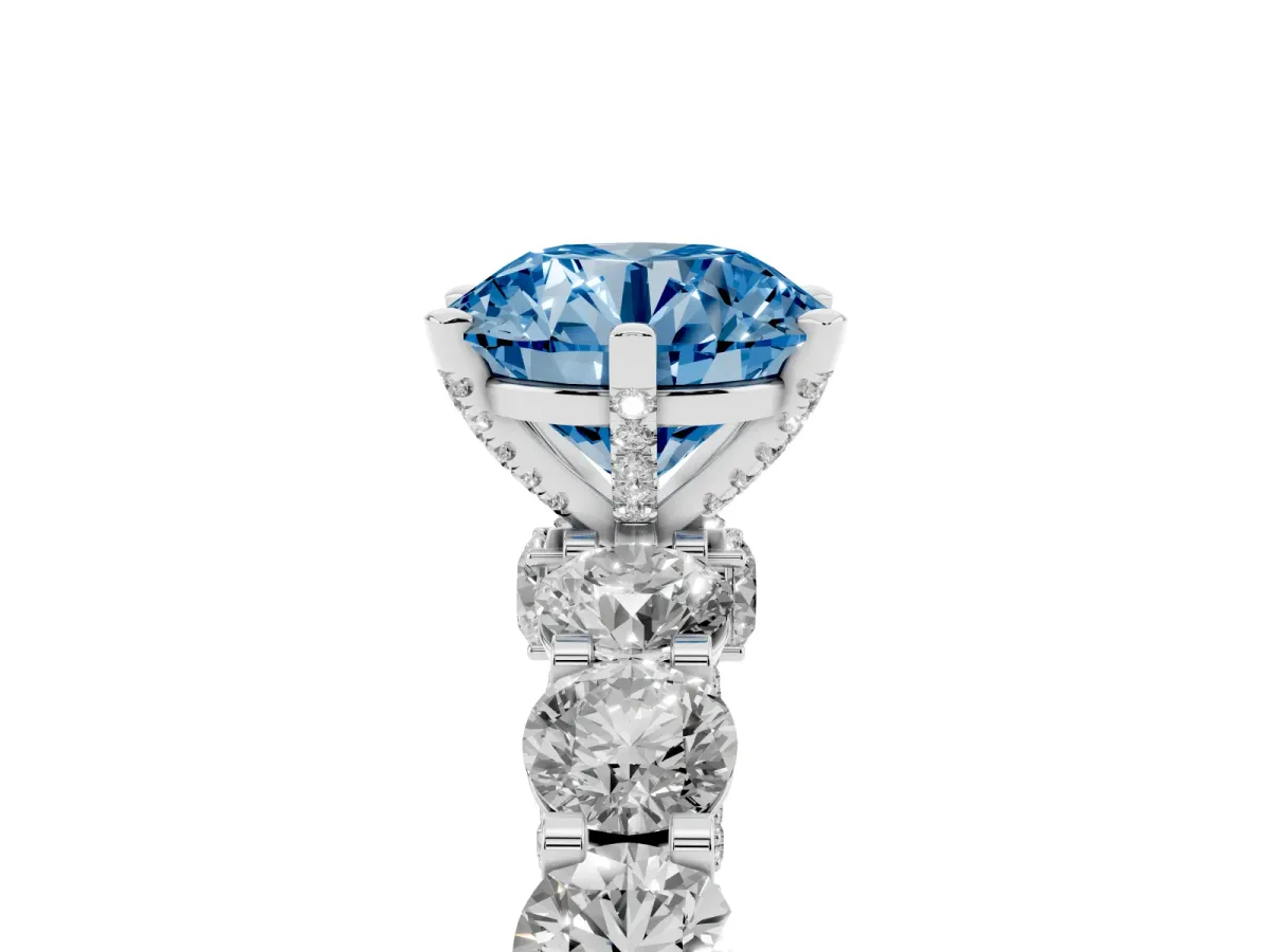 Fancy Blue Round Cut Diamond Side Stone Engagement Ring with Four-Prong Setting Silver