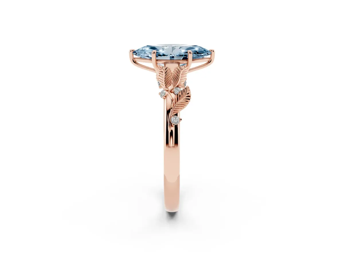 Fancy Blue Marquise Cut Diamond Solitaire Ring with Leaf Motif Band and Four-Prong Setting Rose gold