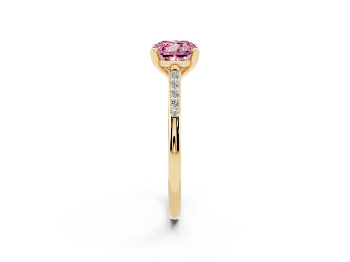 Fancy Pink Cushion Cut Diamond Solitaire Ring with Channel Set Round Band and Prong Setting Yellow gold