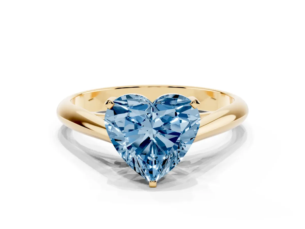 Fancy Blue Heart Cut Diamond Solitaire Engagement Ring with Cathedral Setting and Four-Prong Mount Yellow gold
