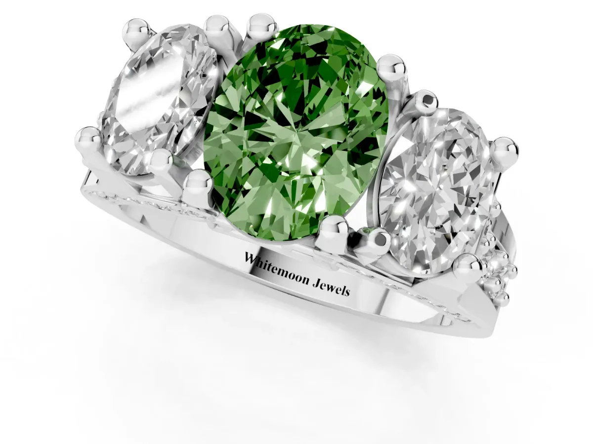 Fancy Green Oval Cut Diamond Three-Stone Ring with Channel Set Band and Four-Prong Setting Silver