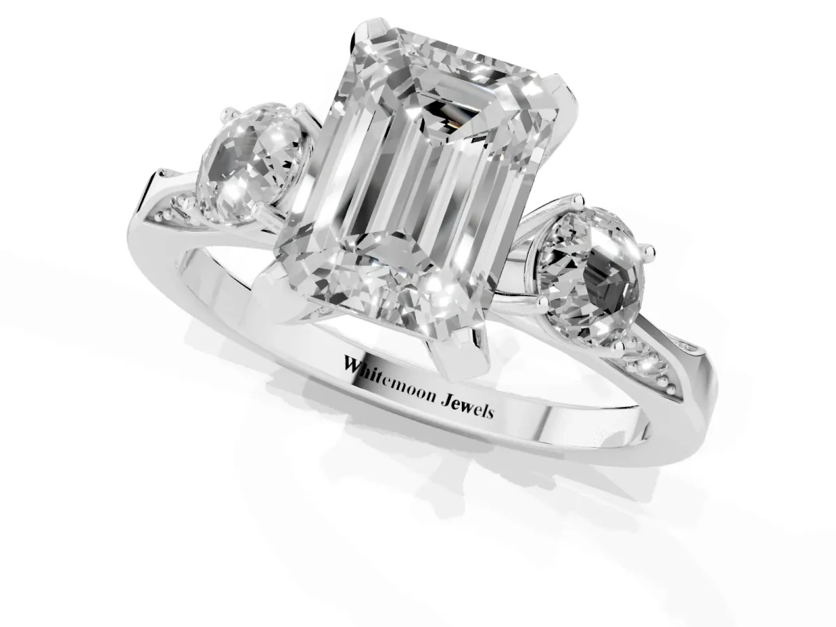 Fancy Black Emerald Cut Brilliant Three-Stone Diamond Ring with Pavé Band and Four-Prong Setting Platinum