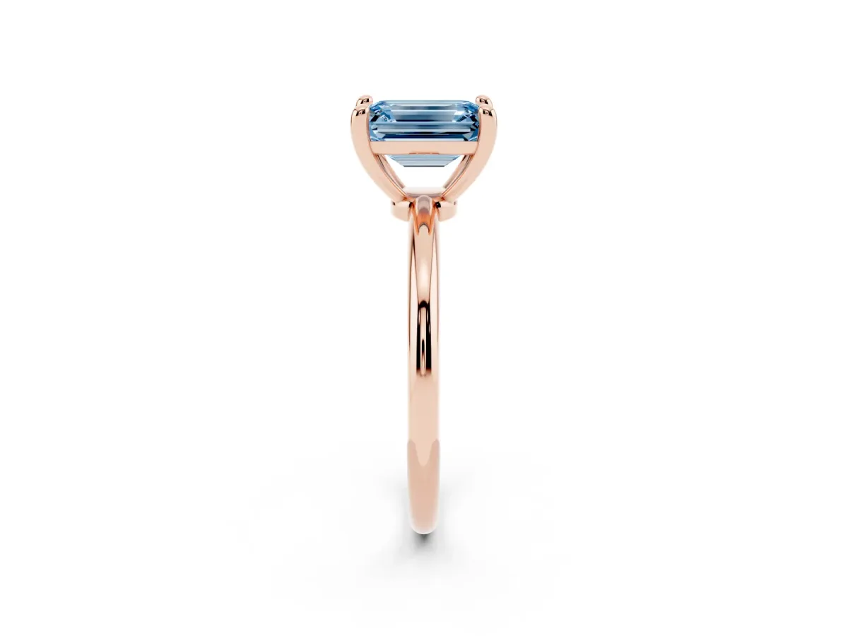 Fancy Blue Emerald Cut Solitaire Diamond Ring with 4-Prong Setting on a Classic Band Rose gold