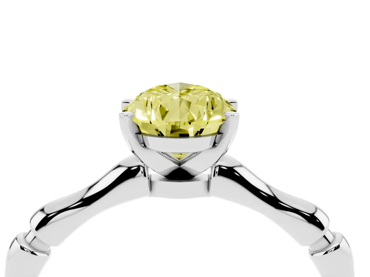 Fancy Yellow Pear Cut Solitaire Diamond Ring with Bamboo Band and Four-Prong Setting Silver