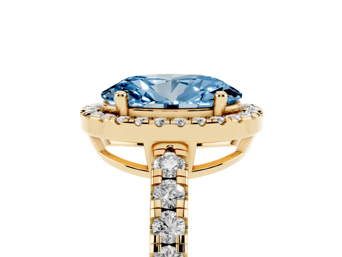 Fancy Blue Oval Cut Diamond Halo Ring with Pavé Band and Four-Prong Setting Yellow gold