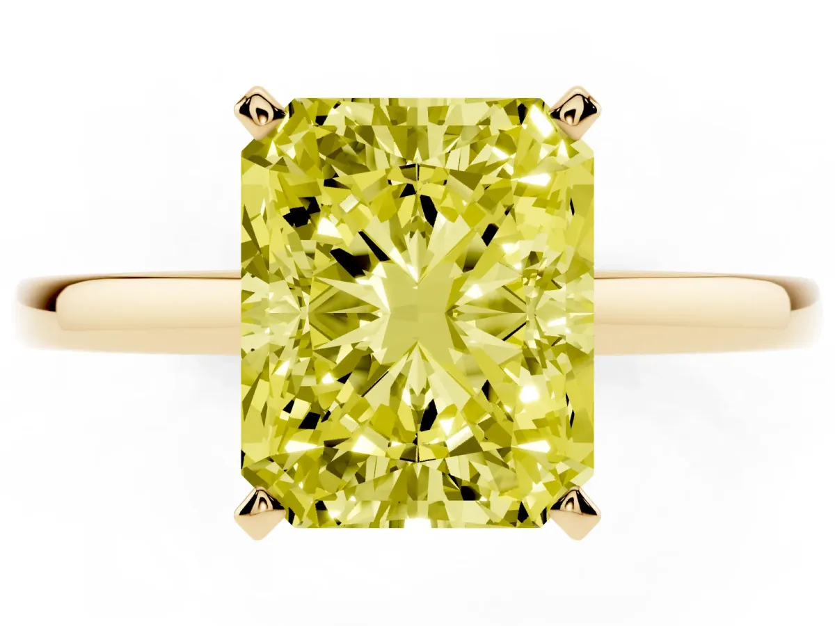 Fancy Yellow Radiant Cut Solitaire Diamond Engagement Ring with Four-Prong Setting on a Classic Band Yellow gold