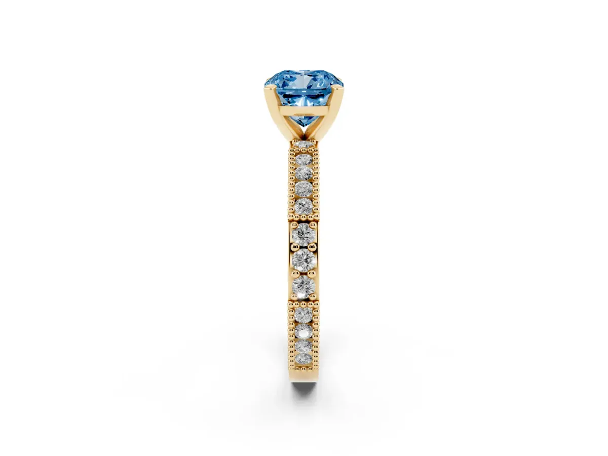 Fancy Blue Cushion Cut Solitaire with Pavé Band and Four-Prong Setting Yellow gold