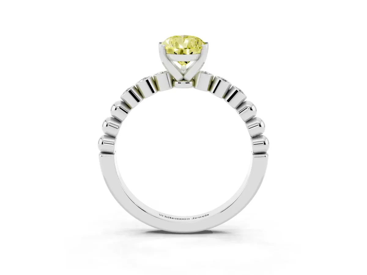 Fancy Yellow Pear Cut Solitaire Bezel Accent Diamond Engagement Ring with Beaded Band and Four-Prong Setting Platinum