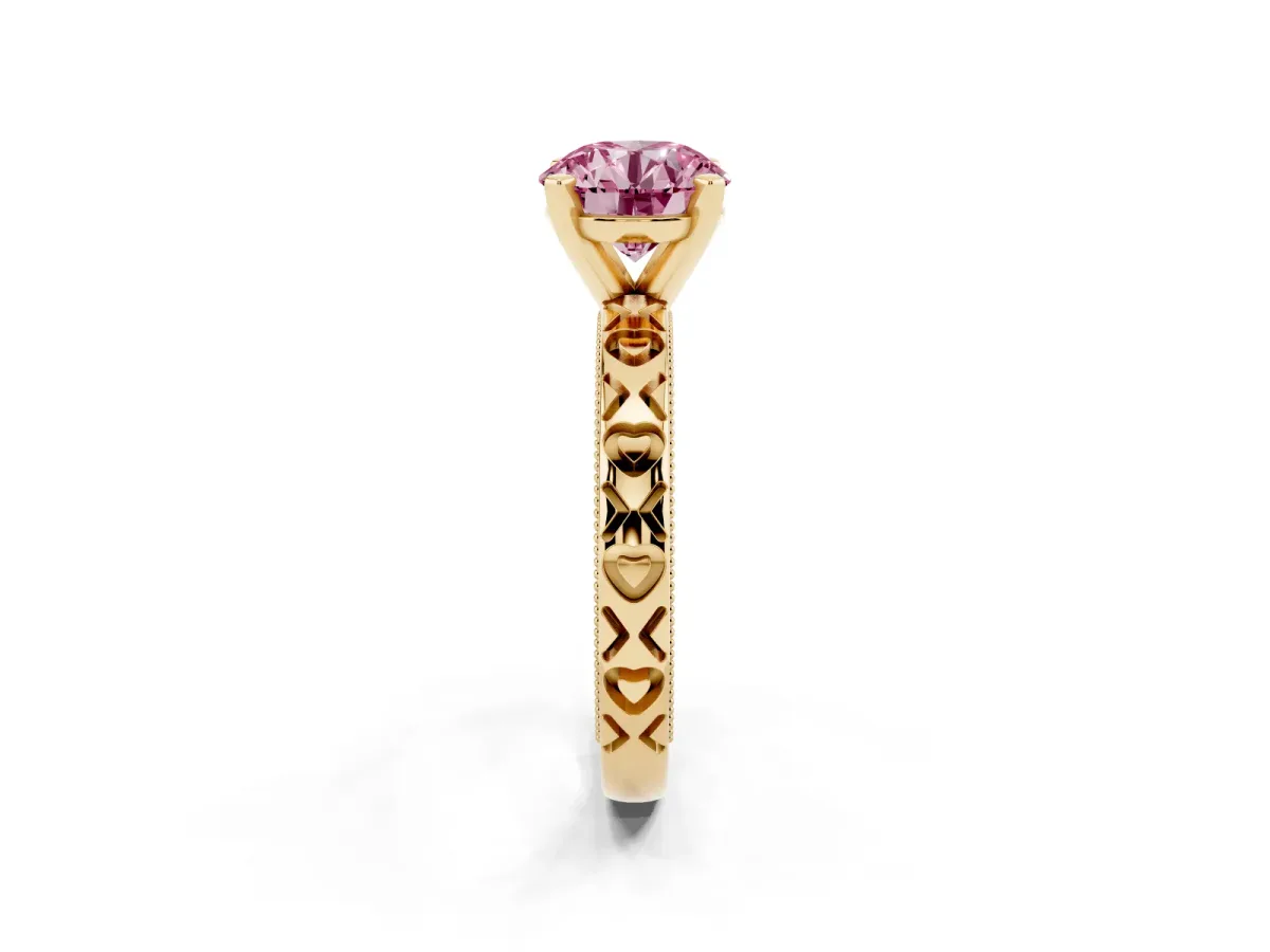 Fancy Pink Round Cut Solitaire Diamond Engagement Ring with XO Engraved Band and Four-Prong Setting Yellow gold