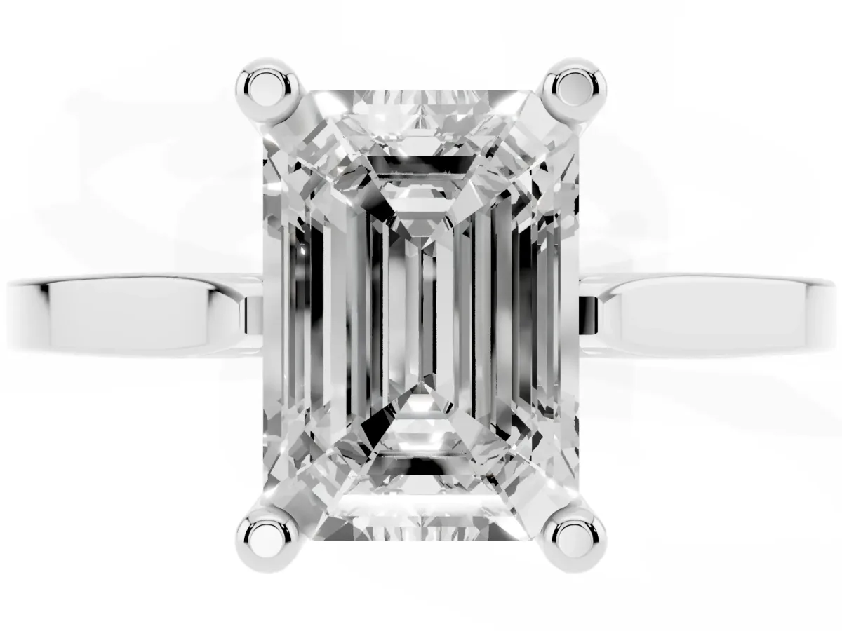 Emerald Cut Solitaire Diamond Ring with Four-Prong Setting and Tapered Band White gold