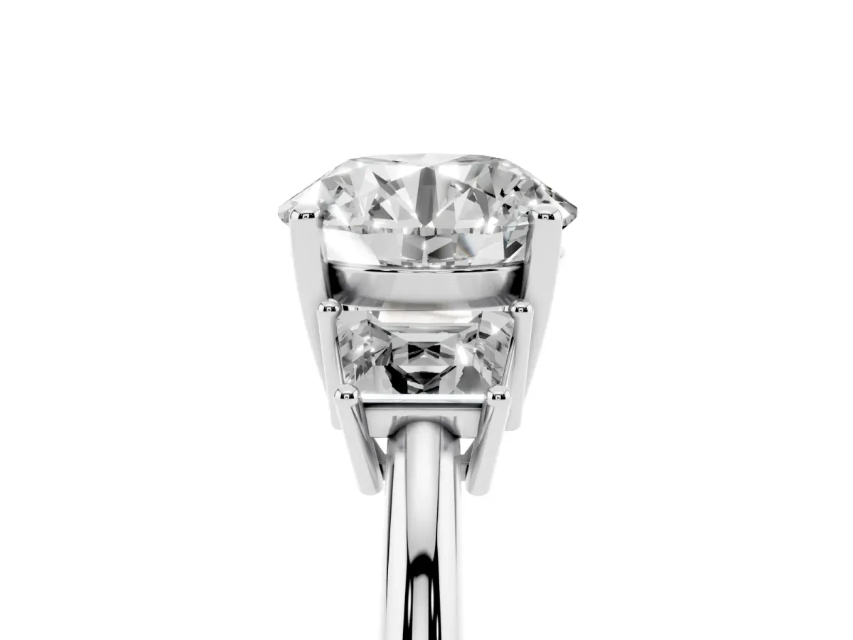 Round Cut Diamond Three-Stone Ring with Trapezoid Side Stones and Prong Setting Platinum