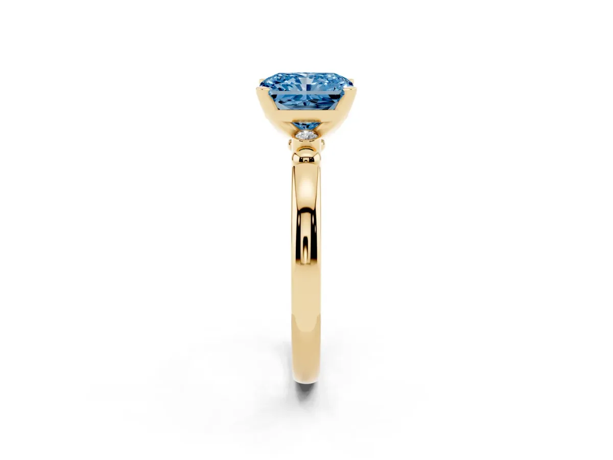 Fancy Blue Radiant Cut Solitaire Beaded Band with Four-Prong Setting Yellow gold