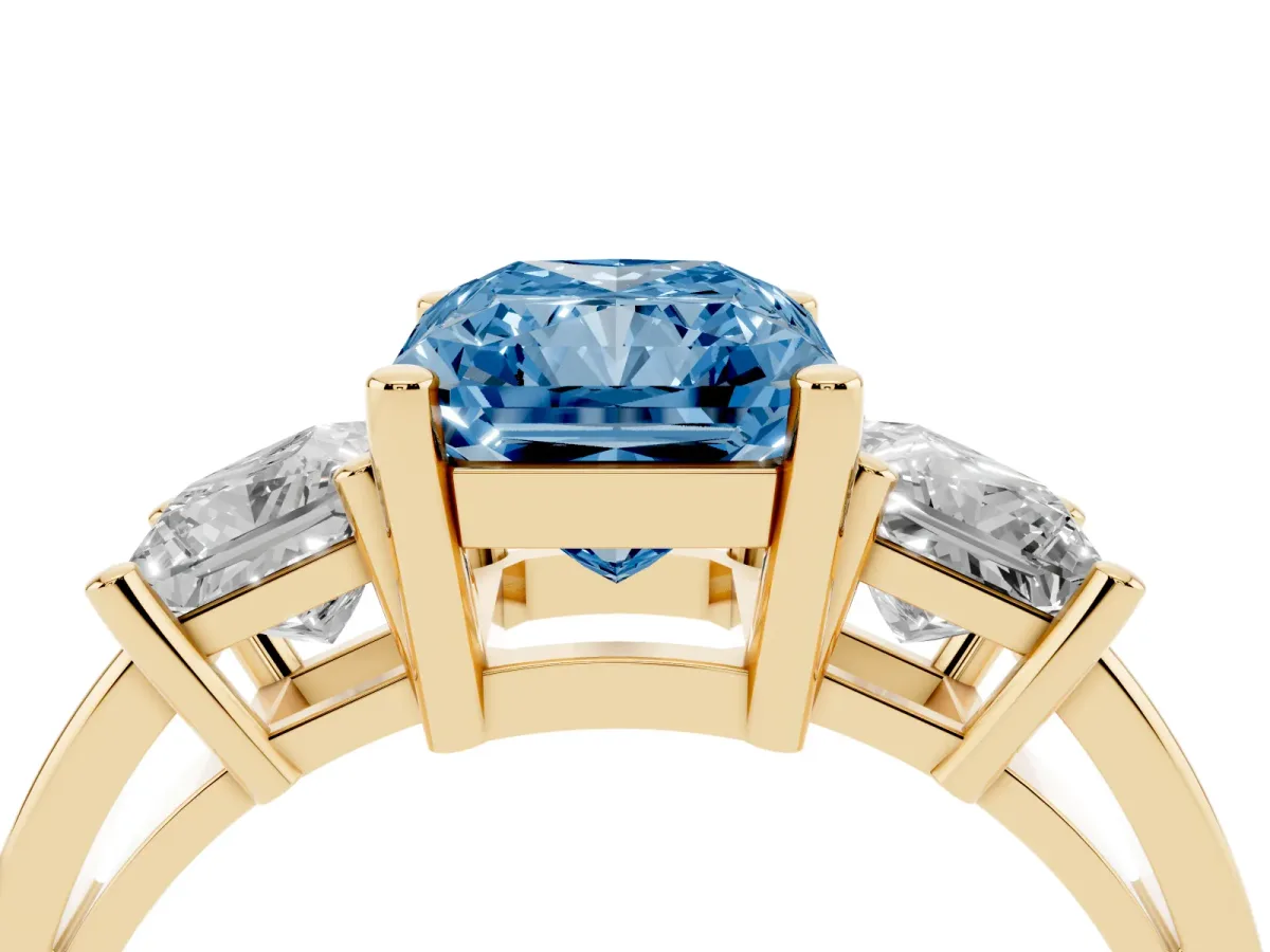 Fancy Blue Three-Stone Radiant Cut Cut Solitaire Ring with Prong Setting Yellow gold