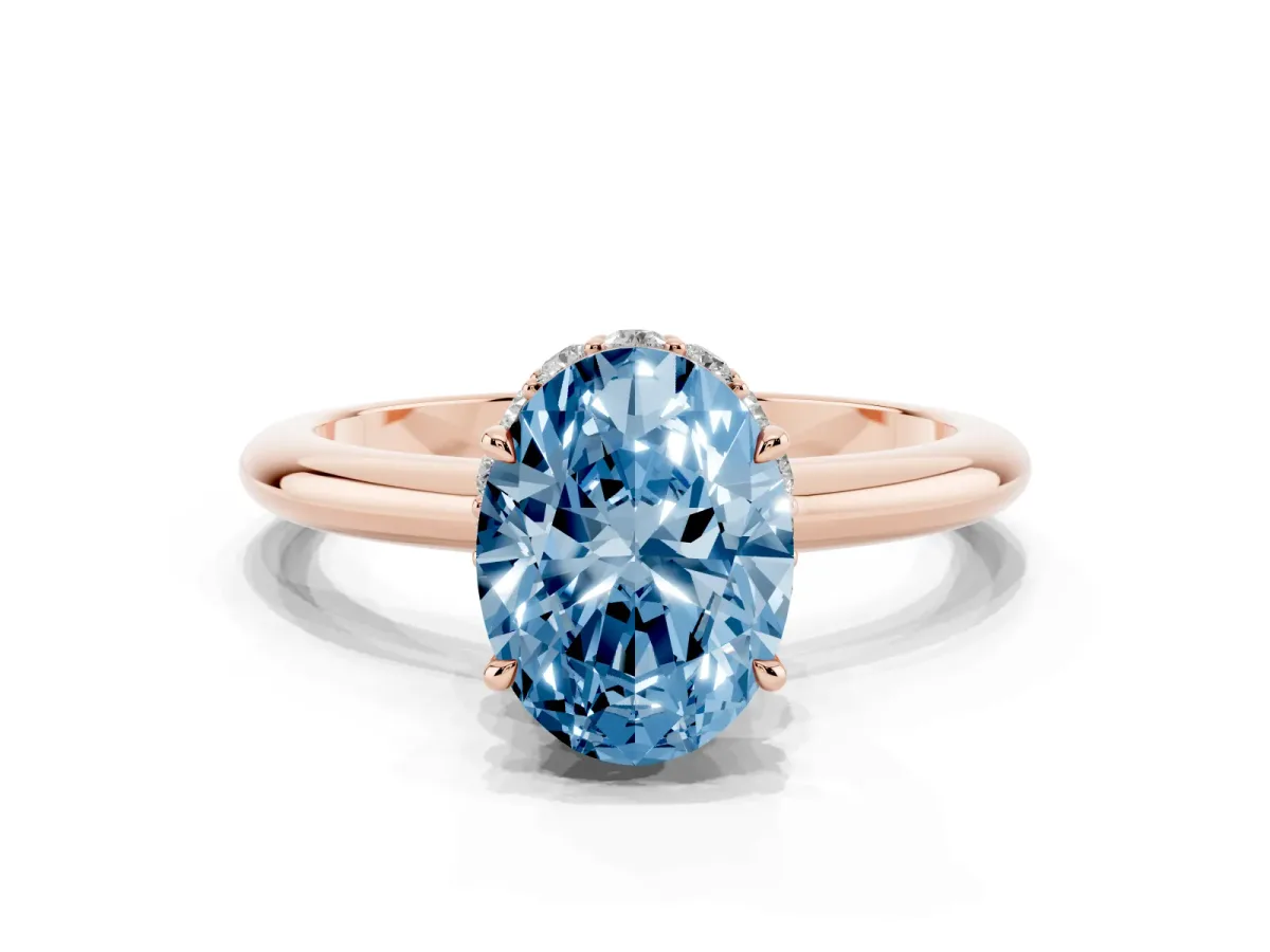 Fancy Blue Oval Cut Brilliant Solitaire Engagement Ring with Six-Prong Setting and Classic Band Rose gold