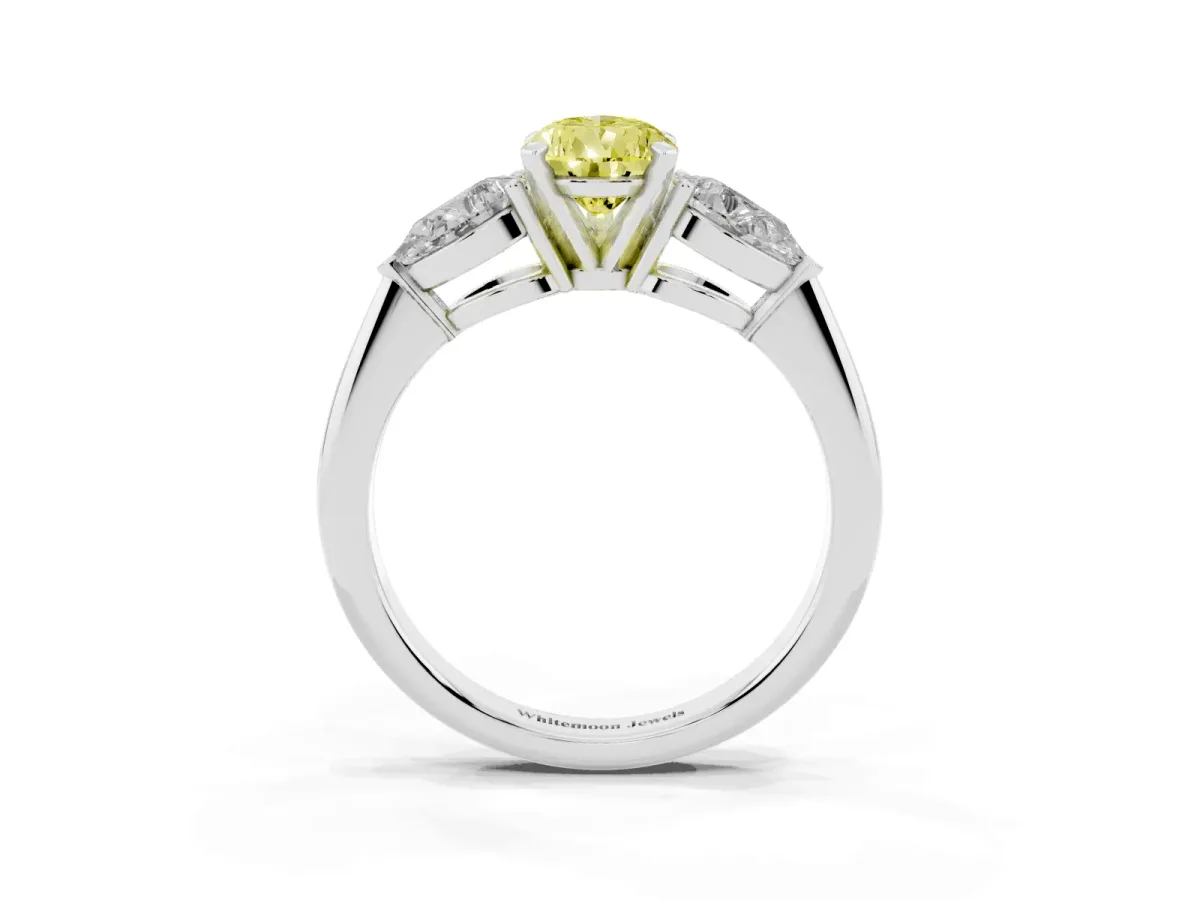 Fancy Yellow Three-Stone Pear Cut Diamond Ring with Pear Side Stones and Four-Prong Setting Silver