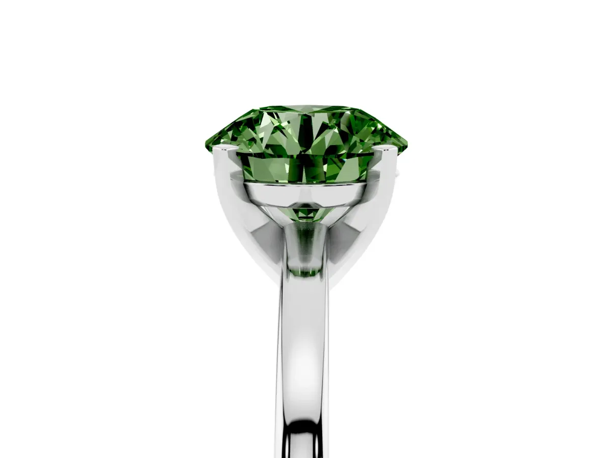 Fancy Green Round Cut Solitaire Diamond Engagement Ring with Four-Prong Setting on a Classic Band Silver