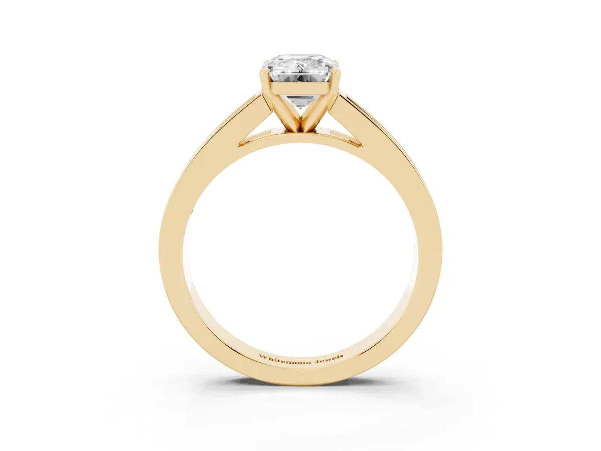 Emerald Cut Solitaire Diamond Ring with Channel-Set Band and Four-Prong Setting Yellow gold