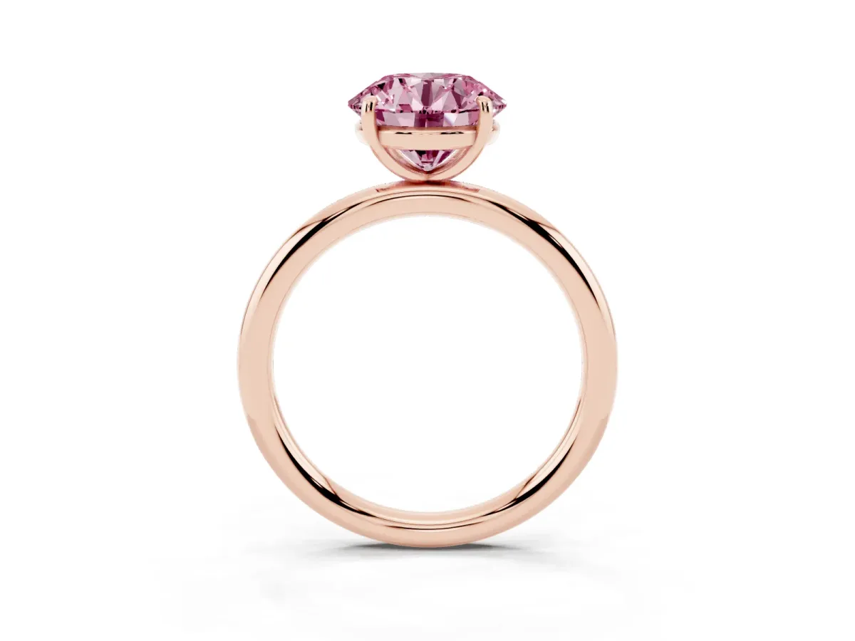 Fancy Pink Round Cut Solitaire Diamond Ring with Four-Prong Setting on a Plain Band Rose gold
