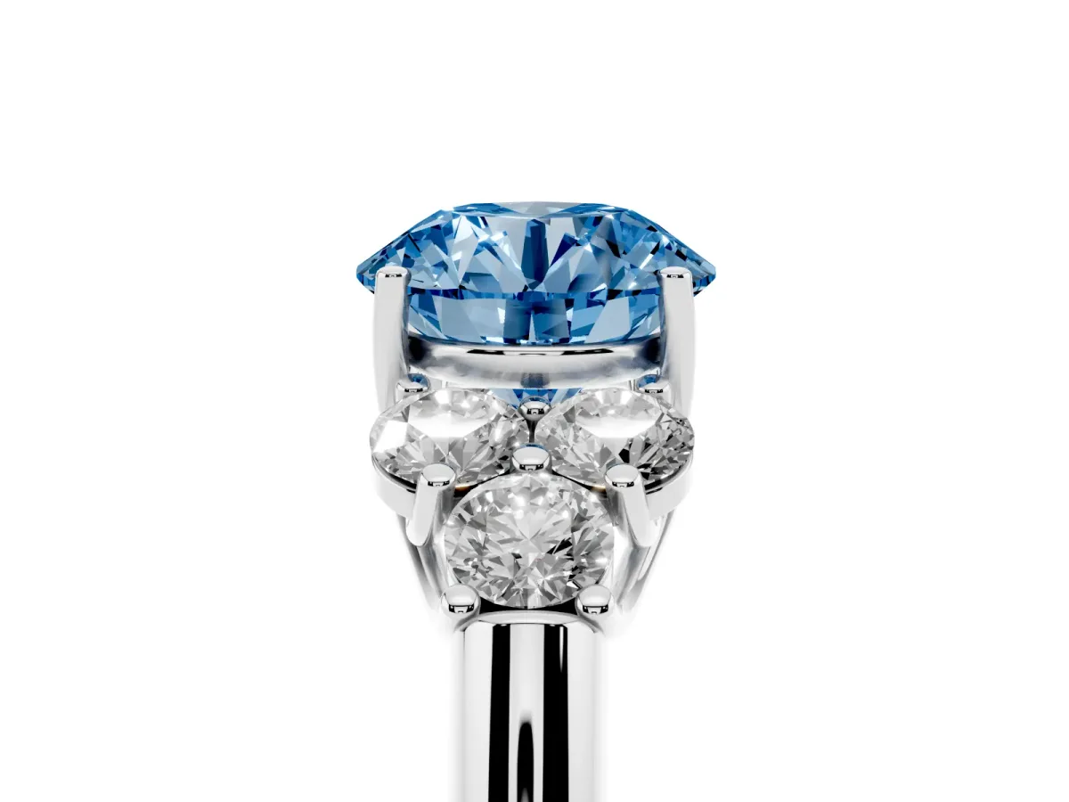 Fancy Blue Round Cut Cut Diamond Cluster Ring with Round Accent Stones and Prong Setting on a Classic Band Silver